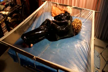 Slimy Rubber - Mistress play with her doll slimy games in the rubber bed